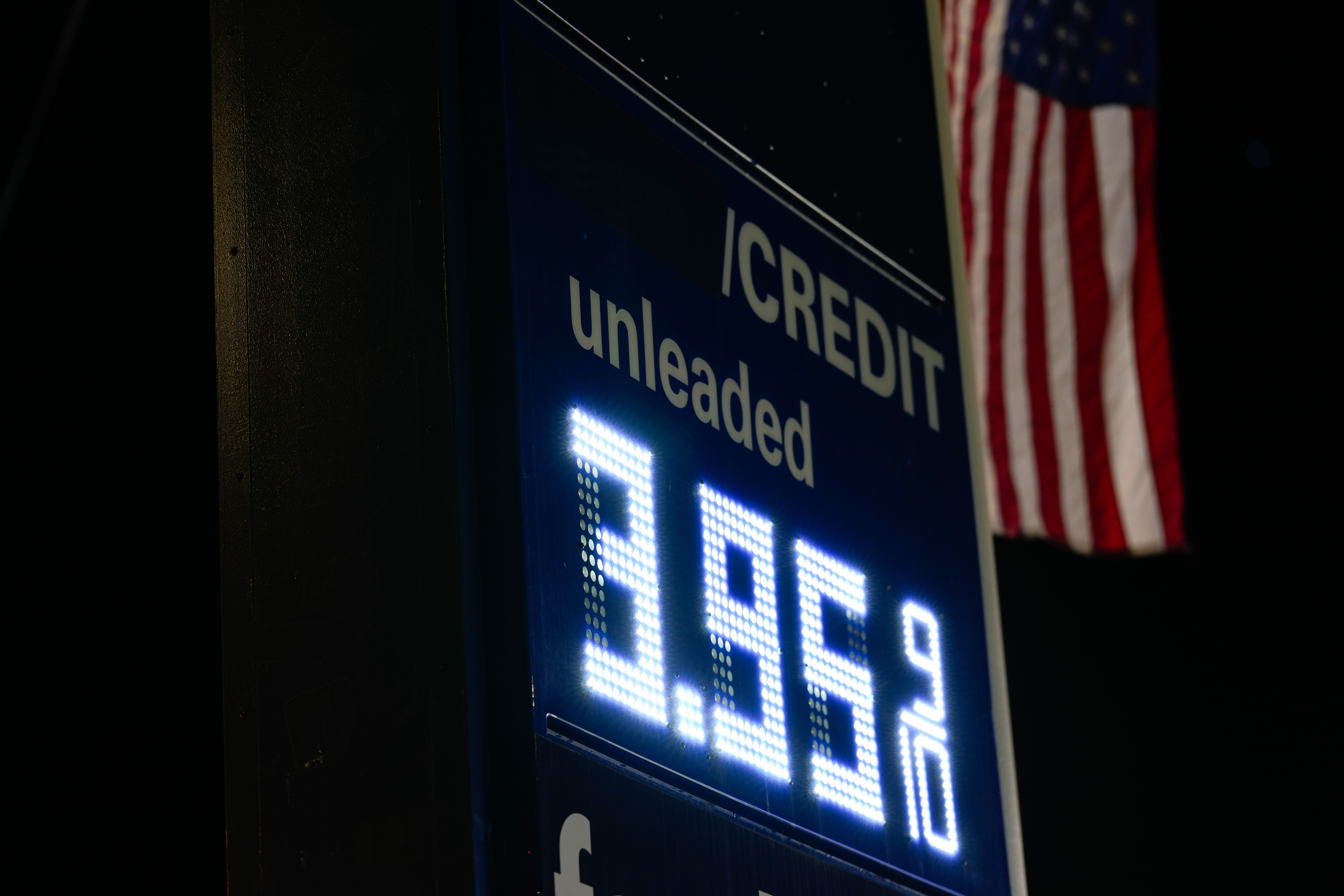 An American flag flies outside a gas station, March 8, 2026, Portland, Ore.