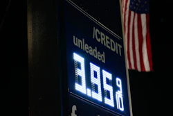 An American flag flies outside a gas station, March 8, 2026, Portland, Ore.