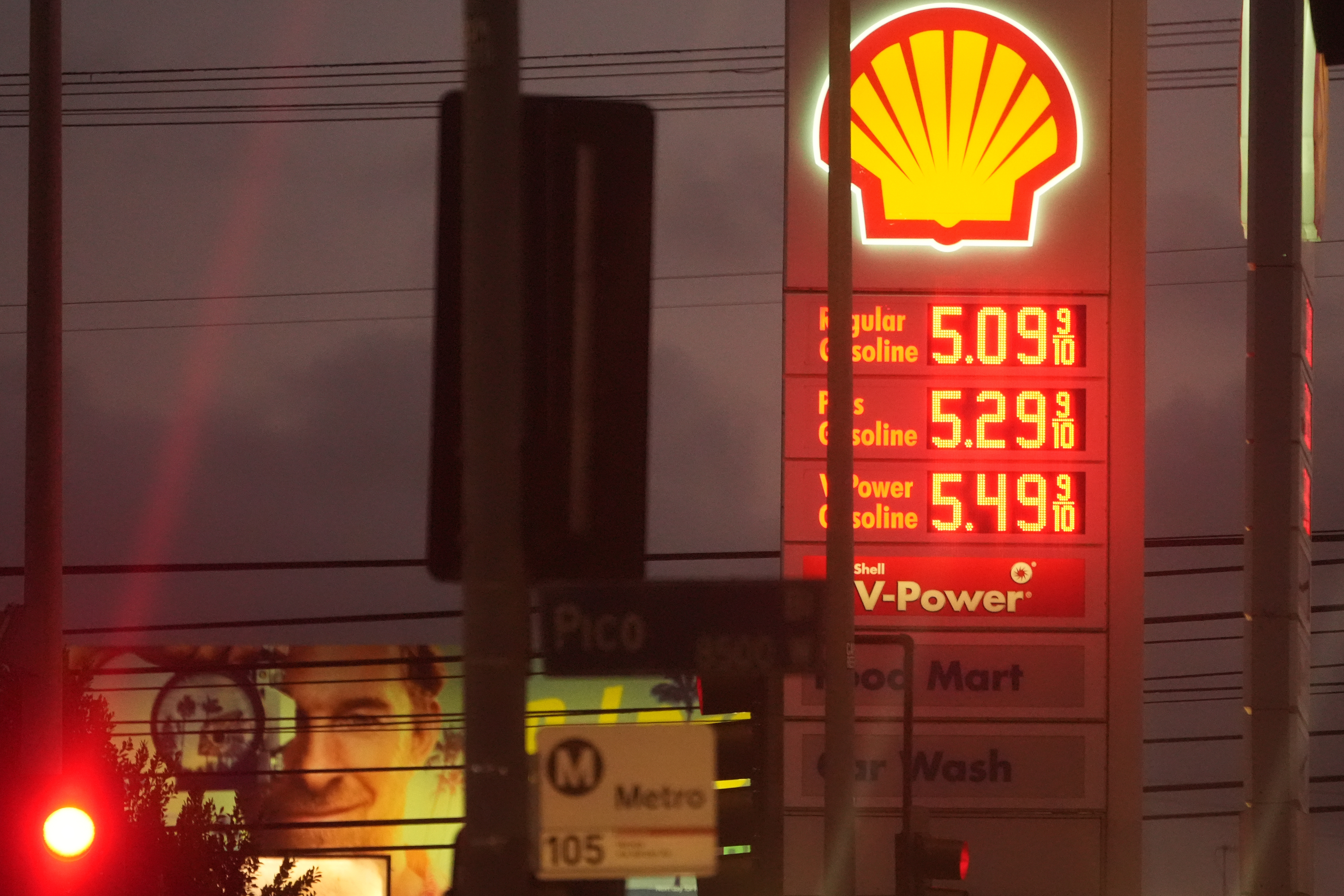 Gas prices are displayed at a gas station in Los Angeles, March 9, 2026.