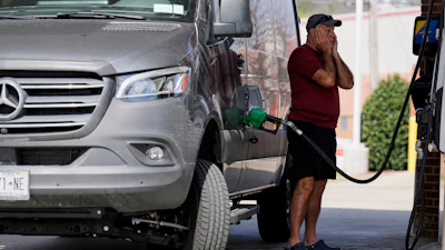 Ray Ruda fills his van at a gas station, March 25, 2026, Brentwood, Tenn.