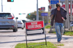 A now hiring sign on the side of the road in Garland, Texas, March 23, 2026.