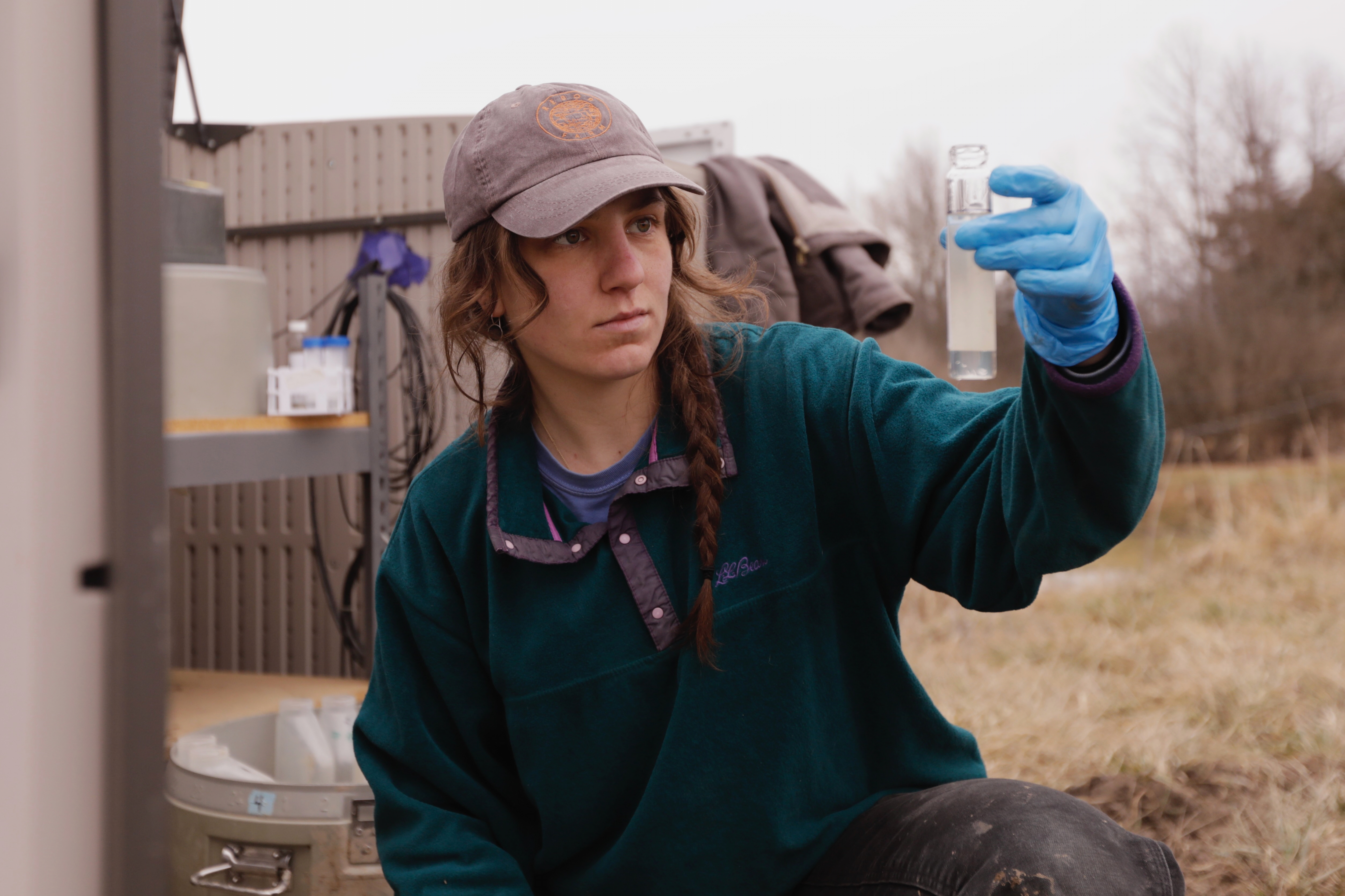 University of Vermont graduate student Delaney Bullock gathers runoff samples in Bridport, Vt., March 12, 2026.