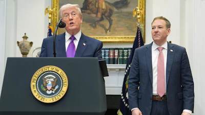 President Donald Trump, left, speaks during an event with Environmental Protection Agency director Lee Zeldin in the Roosevelt Room of the White House, Feb. 12, 2026, in Washington.