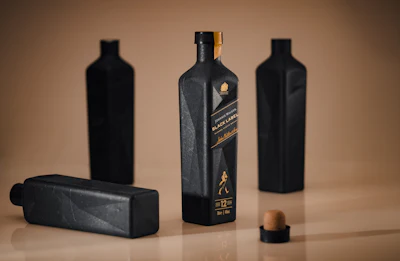 These bottles of Johnnie Walker Black Label whisky are made from 90% paper.