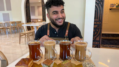 Franchisee Ahmad Badr serves a drink and treat sampler at Arwa Yemeni Coffee in Sunnyvale, Calif., April 6, 2026.