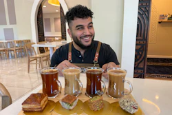 Franchisee Ahmad Badr serves a drink and treat sampler at Arwa Yemeni Coffee in Sunnyvale, Calif., April 6, 2026.