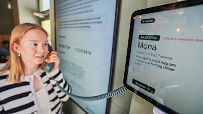 Hanna Petersson, a member of Andon Labs’ technical staff, uses a telephone to speak with Andon Café's AI agent, 'Mona,' in Stockholm, May 5, 2026.