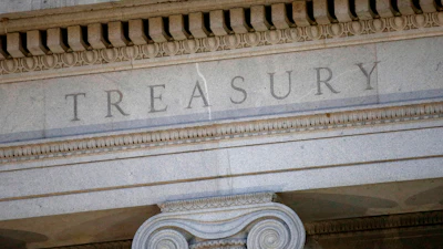 The Treasury Department building is pictured at dusk in Washington, June 6, 2019.