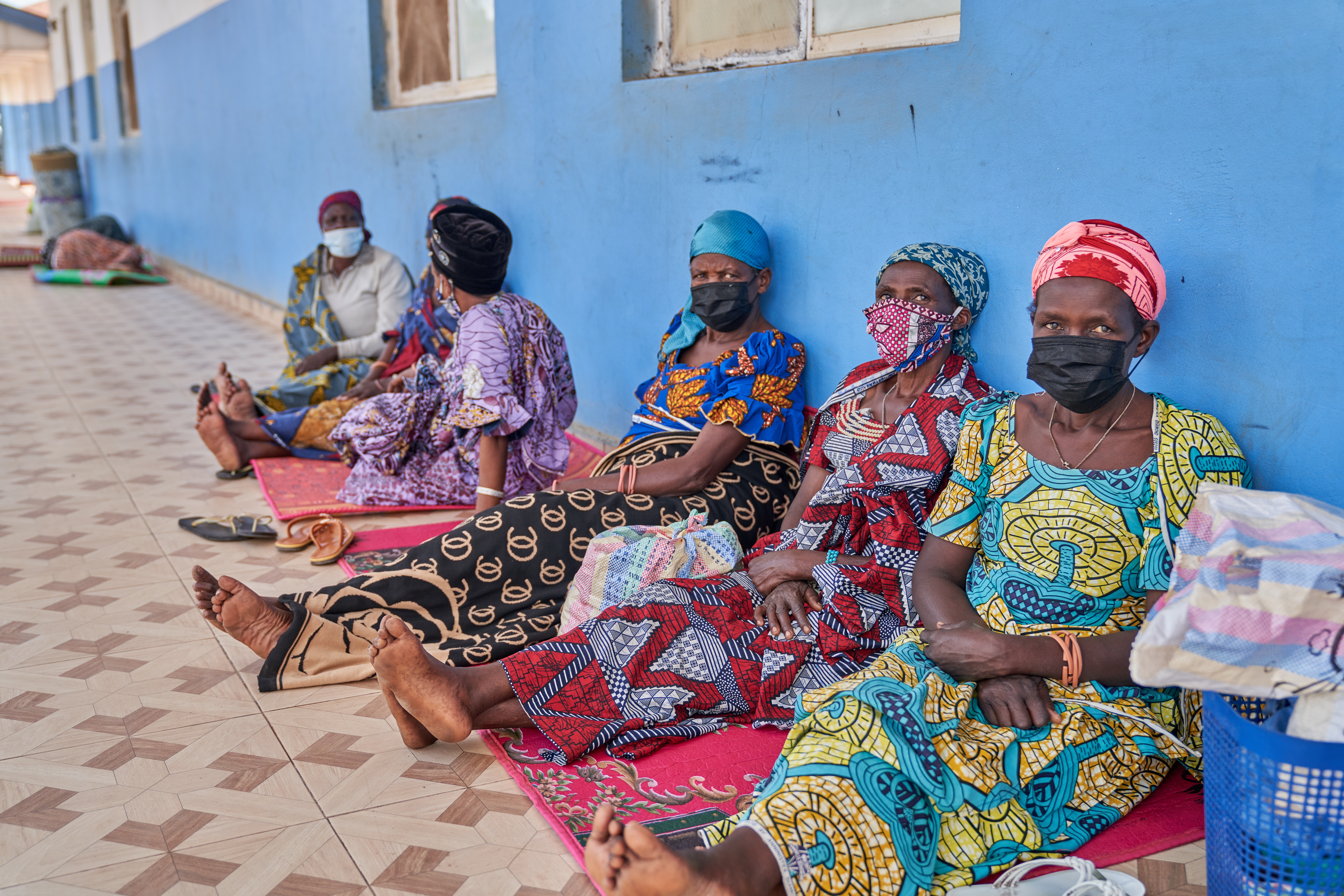 People in protective masks wait in the corridor of a hospital in Bunia, Congo, May 19, 2026.