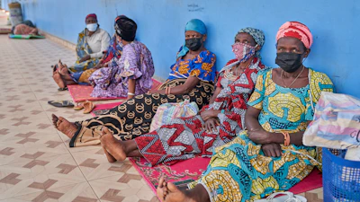 People in protective masks wait in the corridor of a hospital in Bunia, Congo, May 19, 2026.