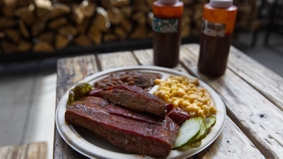 A plate of ribs and sausage at the Little Miss BBQ in Phoenix, May 19, 2026.