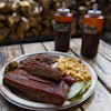 A plate of ribs and sausage at the Little Miss BBQ in Phoenix, May 19, 2026.