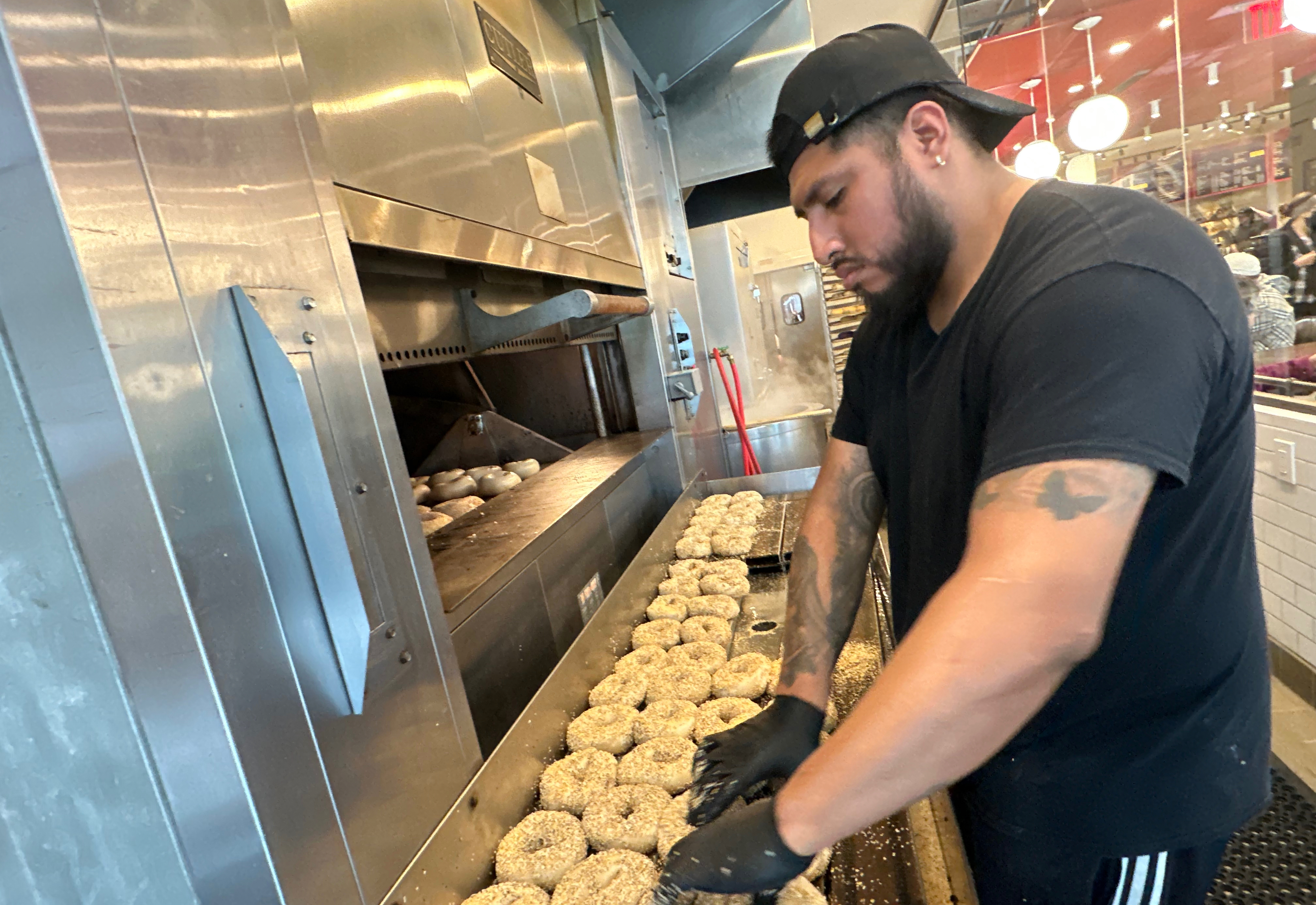 A worker at Utopia Bagel in Queens, New York, May 13, 2026.