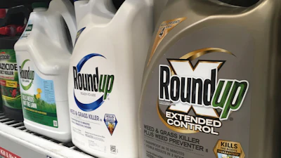 Containers of Roundup are displayed on a store shelf in San Francisco, Feb. 24, 2019.