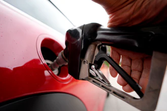 A motorist pumps fuel at a Shell station Wednesday, July 5, 2023, in Englewood, Colo.