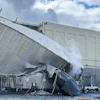 This photo provided by the City of Longview, Wash., shows structural damage to the Nippon Dynawave Packaging Co., after a tank containing hazardous liquid imploded, on Tuesday, May 26, 2026 in Longview, Wash.