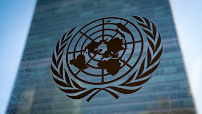 The symbol of the United Nations is displayed outside the Secretariat Building, Feb. 28, 2022.