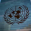 The symbol of the United Nations is displayed outside the Secretariat Building, Feb. 28, 2022.