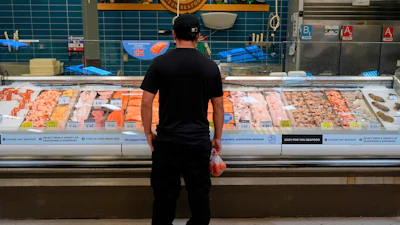 A person looks at fresh fish at a grocery store in Nashville, May 11, 2026.