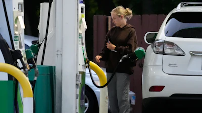 A customer at a gas station in Lincolnshire, Ill., June 8, 2026.