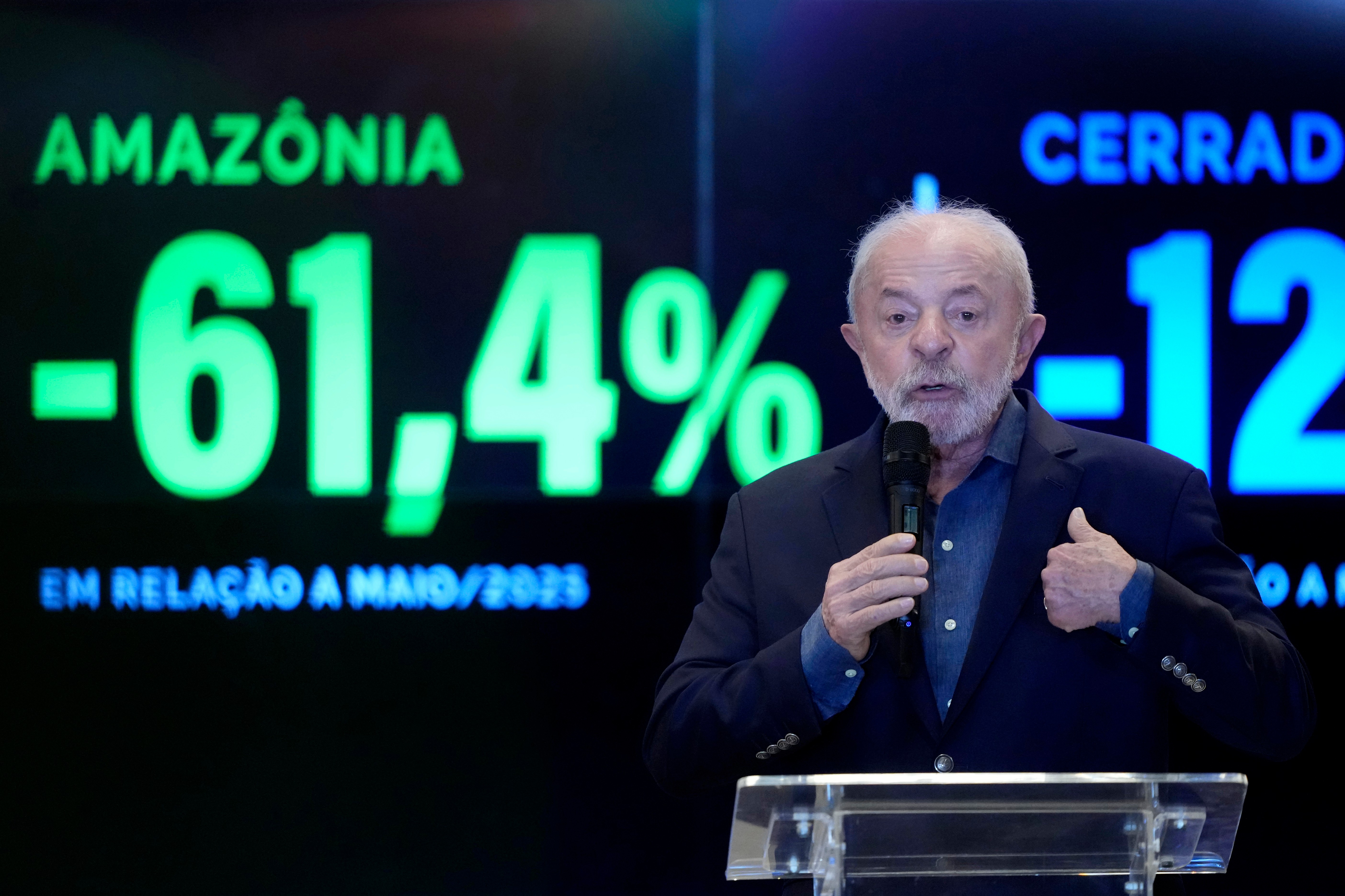 Brazilian President Luiz Inacio Lula da Silva speaks in front of a screen displaying a 61.4% decrease in Amazon deforestation, Amazon Regional Observatory of the Amazon Cooperation Treaty Organization, Brasilia, June 11, 2026.