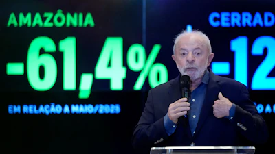 Brazilian President Luiz Inacio Lula da Silva speaks in front of a screen displaying a 61.4% decrease in Amazon deforestation, Amazon Regional Observatory of the Amazon Cooperation Treaty Organization, Brasilia, June 11, 2026.