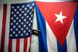 A U.S. and Cuban flag on a wall in Havana, Jan. 11, 2021.