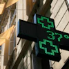 A sign outside a pharmacy displays a temperature of 37 degrees Celsius (98.6 degrees Fahrenheit) in Paris, June 21, 2026.