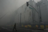 Smoke from a warehouse fire fills the air in the Boyle Heights neighborhood of Los Angeles, June 21, 2026.