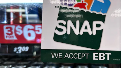 A SNAP sign displayed at a gas station in Riverwoods, Ill., Nov. 1, 2025.