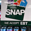 A SNAP sign displayed at a gas station in Riverwoods, Ill., Nov. 1, 2025.