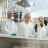 Nelson Jameson Employee And Customers Looking At Plant Equipment