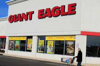 A man walks out of the Giant Eagle grocery store, Nov. 17, 2011, Mayfield Heights, Ohio.