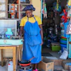Grace Kathambi uses a bioethanol fuel stove to fry and sell French fries at her shop in Kibera, an informal settlement on the outskirts of Nairobi, Kenya, Feb. 4, 2026.