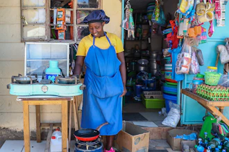 Grace Kathambi uses a bioethanol fuel stove to fry and sell French fries at her shop in Kibera, an informal settlement on the outskirts of Nairobi, Kenya, Feb. 4, 2026.