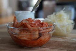 Kimchi, sauerkraut and yogurt displayed on a kitchen table in New York, July 10, 2026.