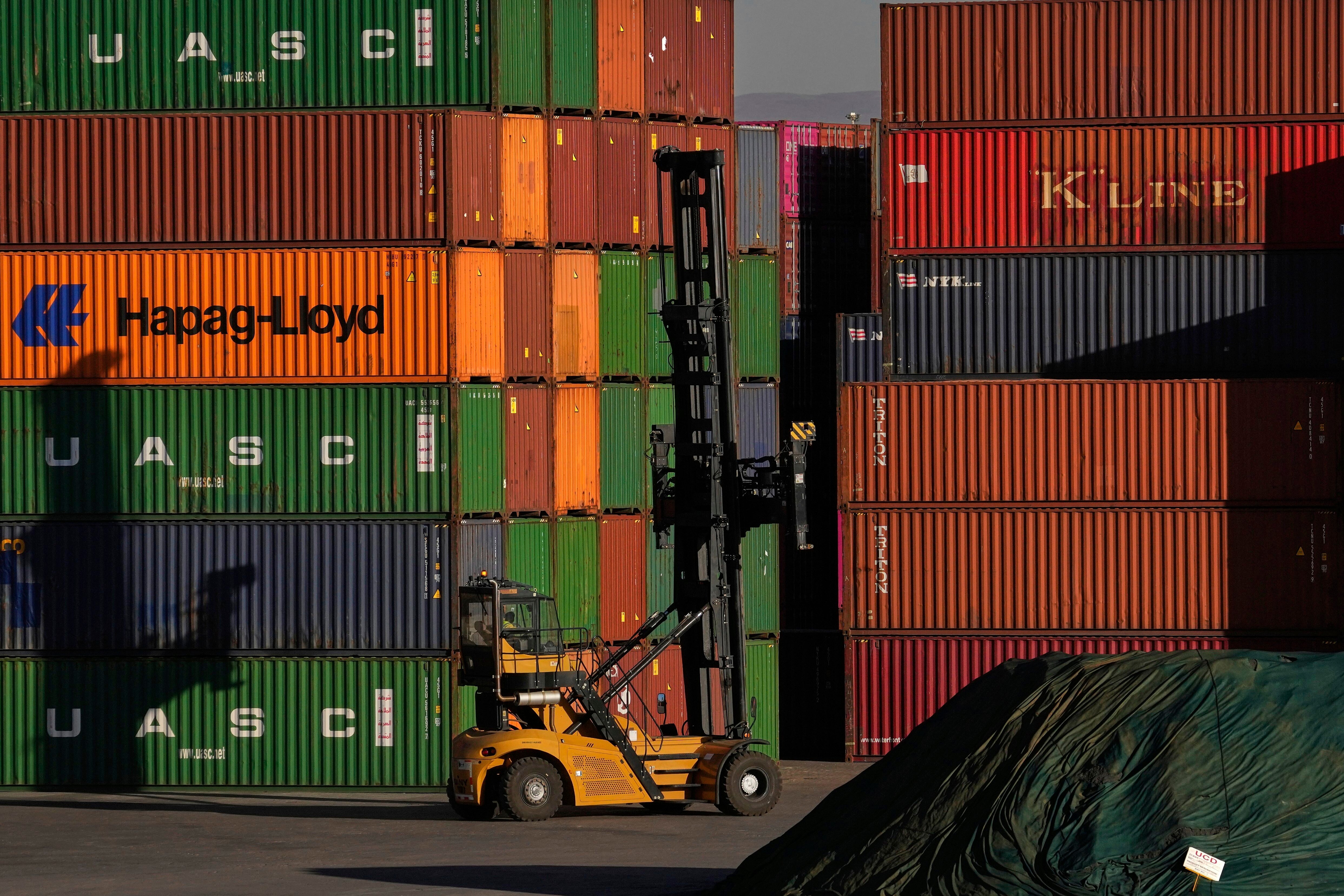 Shipping containers stacked at a depot in Johannesburg, South Africa, Aug. 1, 2025.