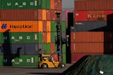 Shipping containers stacked at a depot in Johannesburg, South Africa, Aug. 1, 2025.