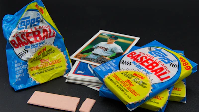 Baseball trading cards, gum and packs are displayed in Phoenix, July 15, 2026.