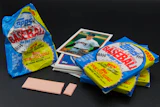 Baseball trading cards, gum and packs are displayed in Phoenix, July 15, 2026.