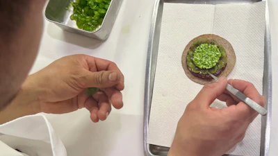 A tostada with bluefin tuna is prepared at Californios in San Francisco, July 16, 2026.