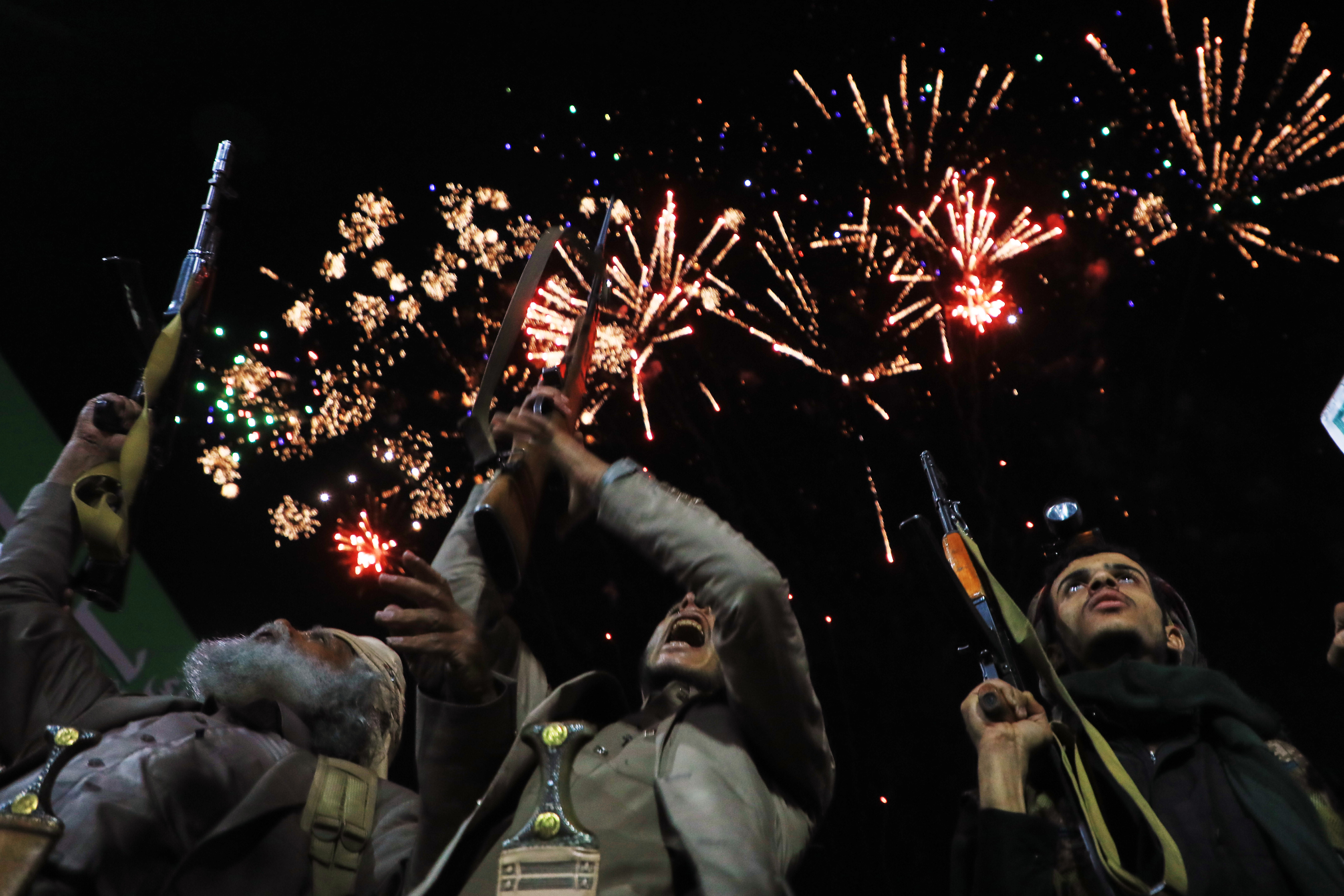 Fireworks burst as Houthi supporters rally against the Saudi-led coalition in Sanaa, Yemen, July 20, 2026.