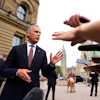 Canada Prime Minister Mark Carney takes questions outside the Office of the Prime Minister and Privy Council in Ottawa, July 21, 2026.