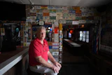 Bobby Kuchinsky, general manager of Half Shell Raw Bar, poses inside his restaurant in Key West, Fla., July 25, 2026.