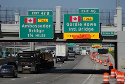 Exits from Interstate 75 are displayed for the Gordie Howe International Bridge and Ambassador Bridge connecting Windsor, Ontario, with Detroit, Tuesday, July 14, 2026,