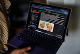 Faith Maeba, a student at Virginia Commonwealth University, shares an assignment for a Practical AI Synthesis course, Stafford, Va., July 20, 2026.