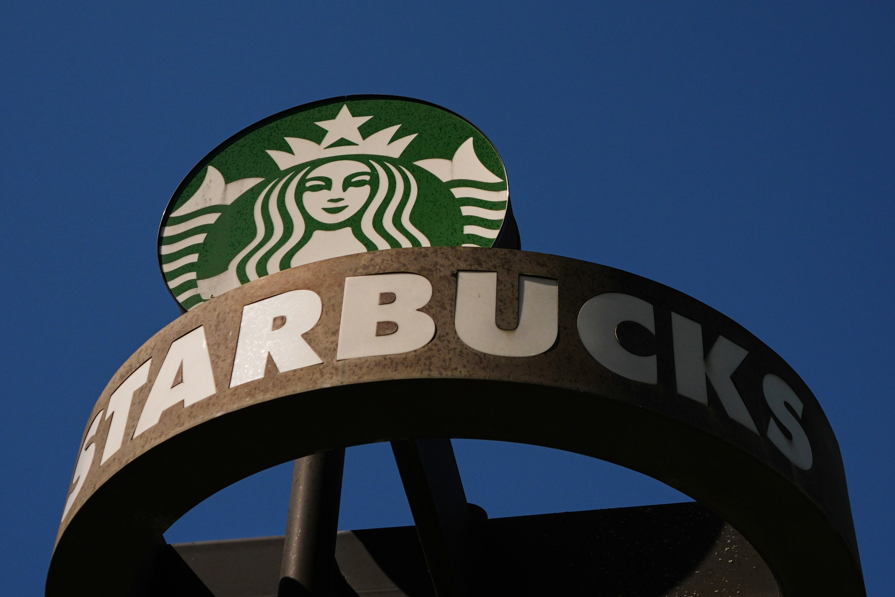 A Starbucks sign outside the coffee company's global headquarters, Seattle, May 11, 2026.