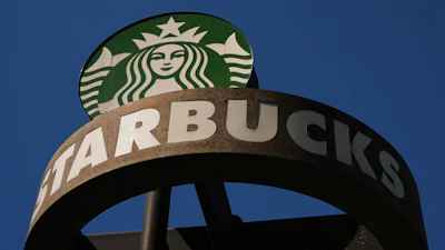 A Starbucks sign outside the coffee company's global headquarters, Seattle, May 11, 2026.