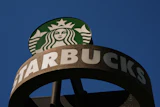 A Starbucks sign outside the coffee company's global headquarters, Seattle, May 11, 2026.