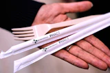 Compostable straws and a fork are displayed at CJ Biomaterials, Woburn, Mass., Aug. 3, 2026.
